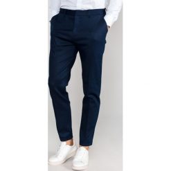 Scotch & Soda Mott Spodnie Niebieski. Niebieskie spodnie męskie Scotch & Soda, bez wzorów, z elastanu. Za 533,95 zł.