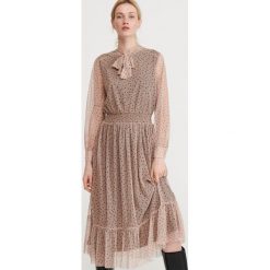 Sukienka w kropki - Beżowy. Brązowe sukienki damskie Reserved, s, bez wzorów, bez kołnierzyka, bez rękawów. Za 119,99 zł.