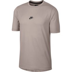 Koszulka Nike NSW Tech Pack Top SS (928623-229). Koszulki męskie Nike, m, bez wzorów, z bawełny, bez kołnierzyka. Za 159,99 zł.