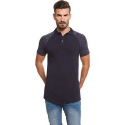 Koszulka polo w kolorze granatowym. Koszulki męskie Lonsdale, Kangol. W wyprzedaży za 59,95 zł.