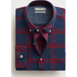 Mango Man - Koszula Pati. Niebieskie koszule męskie Mango Man, l, bez wzorów, z bawełny, casualowe, button down, z długim rękawem. Za 139,90 zł.