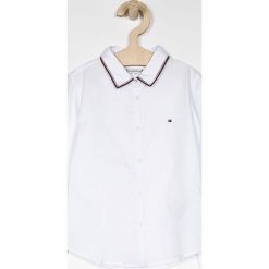 Tommy Hilfiger - Koszula dziecięca 110-176 cm. Niebieskie bluzki dziewczęce TOMMY HILFIGER, bez wzorów, z bawełny, bez kołnierzyka, z długim rękawem, długie, bez kaptura. W wyprzedaży za 159,90 zł.