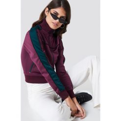 NA-KD Bluza sportowa z suwakiem - Purple. Fioletowe bluzy sportowe damskie marki NA-KD, w paski, z poliesteru. Za 202,95 zł.
