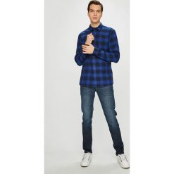 Tommy Jeans - Koszula. Niebieskie koszule męskie Tommy Jeans, s, bez wzorów, z bawełny, klasyczne, z klasycznym kołnierzykiem, z długim rękawem. W wyprzedaży za 179,90 zł.