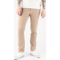 Wrangler Larston Dżinsy Brązowy Beżowy. Pomarańczowe jeansy męskie Wrangler, bez wzorów. Za 438,95 zł.