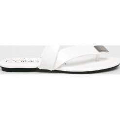 Calvin Klein - Klapki. Białe klapki damskie marki Calvin Klein, z materiału. Za 539,90 zł.