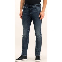 Jeansy Slim Fit Diesel Thommer 00S8M 069GD. Niebieskie jeansy męskie Diesel, s, bez wzorów, z elastanu. W wyprzedaży za 579,00 zł.