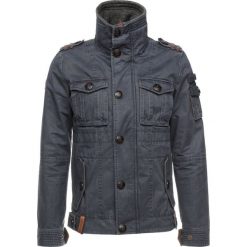 Naketano Kurtka wiosenna dark blue. Niebieskie kurtki męskie marki Naketano, m, bez wzorów, z bawełny. Za 509,00 zł.