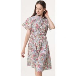 Kremowa Sukienka Acuity. Białe sukienki dziewczęce Born2be, na lato, bez wzorów, bez rękawów, midi, rozkloszowane. Za 59,99 zł.