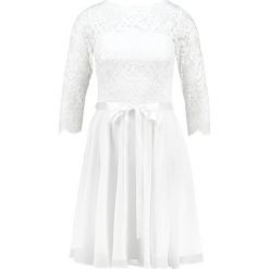 Swing Sukienka koktajlowa creme. Białe sukienki koktajlowe marki Swing, z materiału. Za 599,00 zł.