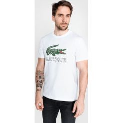Lacoste Koszulka Biały. Białe podkoszulki męskie Lacoste, l, z nadrukiem, z bawełny, bez kołnierzyka, krótkie. Za 223,95 zł.