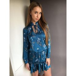 Sukienka TOKYO turkus. Sukienki damskie Divinostyle, s, bez wzorów, z poliesteru, bez kołnierzyka, bez rękawów. W wyprzedaży za 129,00 zł.