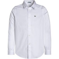 Lacoste Koszula white. Białe koszule chłopięce Lacoste, z bawełny. Za 279,00 zł.