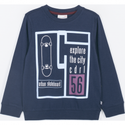 Koszulka. Niebieskie t-shirty chłopięce BREAK THE RULES, z aplikacjami, z długim rękawem. Za 49,90 zł.