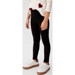 Mango Kids - Legginsy dziecięce Roma. Czarne spodnie dziewczęce Mango Kids, bez wzorów, z elastanu. Za 59,90 zł.