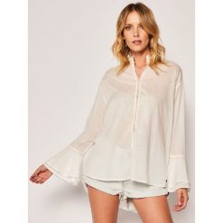 Bluzka One Teaspoon Voile Fantaisi 23318. Białe bluzki damskie One Teaspoon, l, bez wzorów, z bawełny, bez kołnierzyka, bez rękawów. Za 639,00 zł.