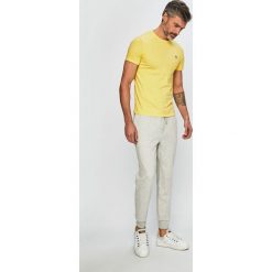 Polo Ralph Lauren - Spodnie. Szare spodnie męskie Polo Ralph Lauren, na co dzień, xl, bez wzorów, z elastanu, casualowe. W wyprzedaży za 269,90 zł.
