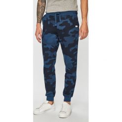 Produkt by Jack & Jones - Spodnie. Niebieskie spodnie męskie PRODUKT by Jack & Jones, na co dzień, s, bez wzorów, z bawełny. W wyprzedaży za 79,90 zł.