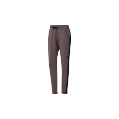 Spodnie treningowe Reebok Sport Spodnie dresowe Training Supply Slim. Szare spodnie damskie marki Reebok Sport, s, z dresówki. Za 249,00 zł.