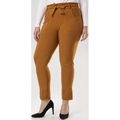Żółte Spodnie Undilis. Żółte spodnie damskie Born2be, xl, bez wzorów, z tkaniny. Za 79,99 zł.