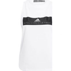 Adidas by Stella McCartney ESSENTIAL LOGO Koszulka sportowa white. Białe topy sportowe damskie marki adidas by Stella McCartney, l, z bawełny. W wyprzedaży za 160,30 zł.