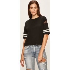 Jacqueline de Yong - T-shirt. Czarne bluzki damskie Jacqueline de Yong, s, bez wzorów, z bawełny, z okrągłym kołnierzem. W wyprzedaży za 49,90 zł.