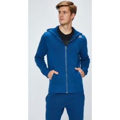 Reebok - Bluza. Niebieskie bluzy męskie Reebok, s, z nadrukiem, z elastanu, z kapturem, bez rękawów, z kapturem. W wyprzedaży za 119,90 zł.