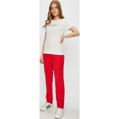 Tommy Jeans - Spodnie. Niebieskie legginsy damskie Tommy Jeans, bez wzorów, z poliesteru. W wyprzedaży za 299,90 zł.