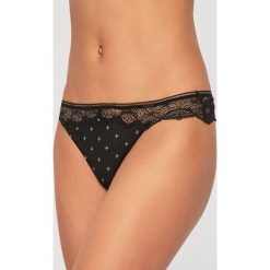 Calvin Klein Underwear - Stringi. Czarne majtki damskie Calvin Klein Underwear, xs, bez wzorów, z elastanu. W wyprzedaży za 99,90 zł.