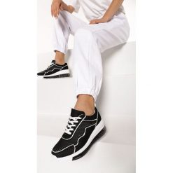 Czarne Sneakersy Asitrise. Czarne koturny damskie Born2be, bez obcasa, na koturnie, na sznurówki. Za 129,99 zł.