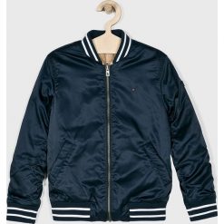 Tommy Hilfiger - Kurtka bomber dwustronna dziecięca 128-176 cm. Niebieskie kurtki dziewczęce TOMMY HILFIGER, bez wzorów, z elastanu, krótkie, bez kaptura. W wyprzedaży za 399,90 zł.