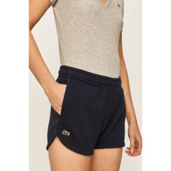 Lacoste - Szorty. Niebieskie szorty damskie Lacoste, bez wzorów, z bawełny, casualowe. Za 259,90 zł.