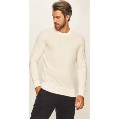 Tommy Hilfiger - Sweter. Białe swetry męskie TOMMY HILFIGER, s, z aplikacjami, z bawełny, z okrągłym kołnierzem, bez kaptura. Za 579,90 zł.
