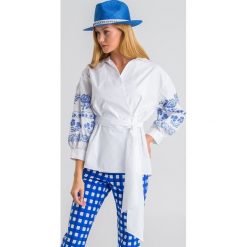 KOSZULA GRADO weekend max mara. Białe koszule damskie Weekend Max Mara, bez wzorów, eleganckie, bez kołnierzyka, bez rękawów. Za 1209,00 zł.