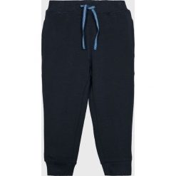 Name it - Spodnie dziecięce 92-116 cm. Niebieskie spodnie chłopięce Name it, bez wzorów, z elastanu, casualowe. W wyprzedaży za 34,90 zł.