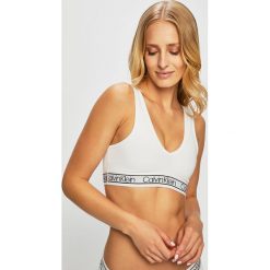 Calvin Klein Underwear - Biustonosz sportowy. Szare biustonosze sportowe damskie Calvin Klein Underwear, s, bez wzorów, z elastanu. W wyprzedaży za 99,90 zł.