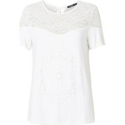 Desigual T-shirt damski TS Cannes L biały. Białe koszulki damskie Desigual, l, w koronkowe wzory, z koronki. W wyprzedaży za 175,00 zł.