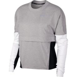 Bluza do biegania damska NIKE THRMA SPHR TOP SD / AJ8671-059. Topy damskie Nike, bez wzorów, bez rękawów, bez kaptura, do biegania. Za 259,99 zł.