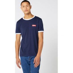 Wrangler Koszulka Niebieski. Niebieskie podkoszulki męskie Wrangler, l, bez wzorów, z bawełny, z krótkim rękawem. Za 137,95 zł.