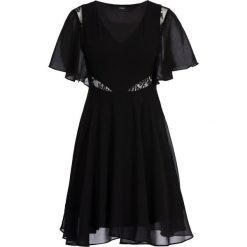 Sukienka letnia Guess W93K80 W8SL0. Czarne sukienki damskie Guess, na lato, xs, z aplikacjami, z poliesteru, bez kołnierzyka, bez rękawów. W wyprzedaży za 209,00 zł.