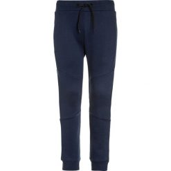 Tumble 'n dry LANCE Spodnie treningowe deep blue. Niebieskie spodnie chłopięce marki Tumble 'n dry, z materiału. Za 169,00 zł.