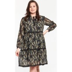 Fantazyjna czarna sukienka Anita w motylki XXL OVERSIZE. Czarne sukienki damskie Moda Size Plus Iwanek, do pracy, na wiosnę, xxl, w koronkowe wzory, z elastanu, biznesowe, ze stójką, z długim rękawem, długie, maxi, oversize. Za 159,00 zł.