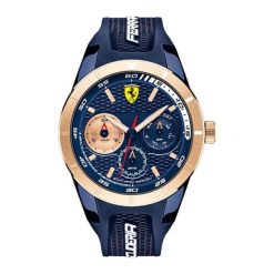Zegarek "0830379-RED-REV-T" w kolorze granatowo-złotym. Niebieskie, analogowe zegarki męskie Lacoste, sztuczne. W wyprzedaży za 687,95 zł.