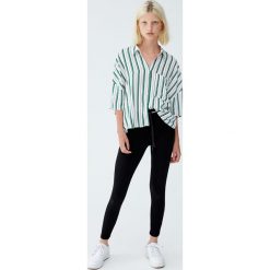 Spodnie basic jogging. Szare spodnie damskie Pull&Bear, z dzianiny. Za 49,90 zł.