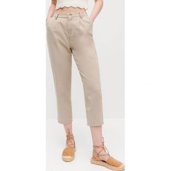 Spodnie chino z Tencelem™ - Beżowy. Brązowe spodnie damskie Reserved, bez wzorów. Za 139,99 zł.