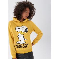 Bluza z kapturem Snoopy - Żółty. Żółte bluzy damskie House, s, bez wzorów, bez rękawów, z kapturem. Za 99,99 zł.