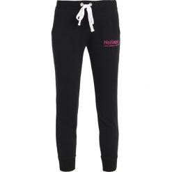 Spodnie dresowe damskie: Hollister Co. LOGO JOGGER Spodnie treningowe black