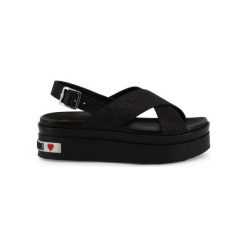 Love Moschino Klapki JA16166G17II. Klapki damskie Love Moschino, w paski, ze skóry, bez obcasa, na koturnie. Za 561,00 zł.