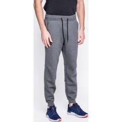 Under Armour - Spodnie Rival Cotton Jogger. Szare joggery męskie marki Under Armour, xl, z bawełny. W wyprzedaży za 219,90 zł.
