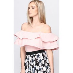 Jasnoróżowa Bluzka Warrior Princess. Różowe bluzki damskie Born2be, s, bez wzorów, z dzianiny, bez kołnierzyka, bez rękawów. Za 59,99 zł.